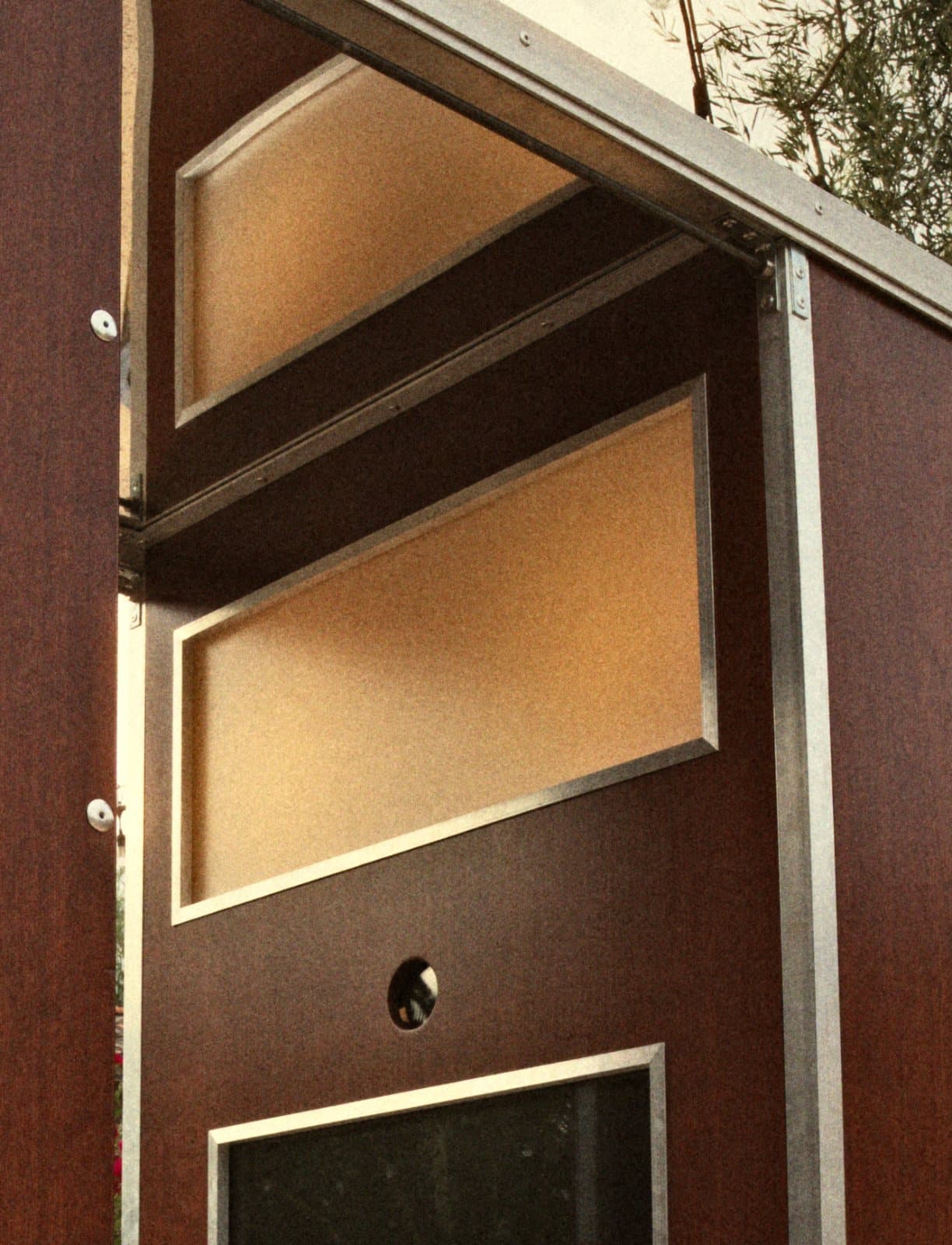 Close-up of the booth light panels, aluminum trim, and camera port